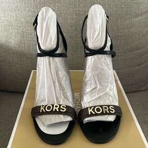 Michael Kors logo high heel sandals.
